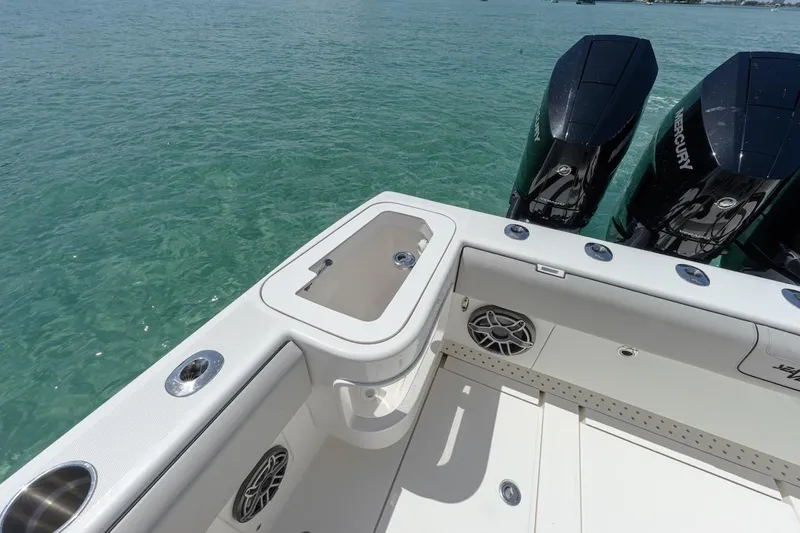  Yacht Photos Pics 2023 SeaVee 370Z boat with triple Mercury engines on clear water.