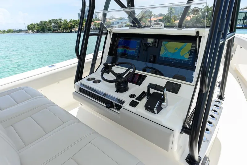  Yacht Photos Pics 2023 SeaVee 370Z boat console with advanced navigation displays and controls.