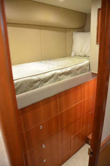 Cuda Yacht Photos Pics 2001 Buddy Davis 61 yacht interior with cozy bunk bed and wooden cabinetry.