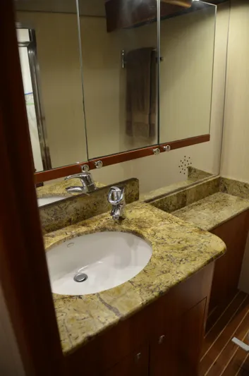 Cuda Yacht Photos Pics Luxurious bathroom with granite countertop in 2001 Buddy Davis 61 yacht.