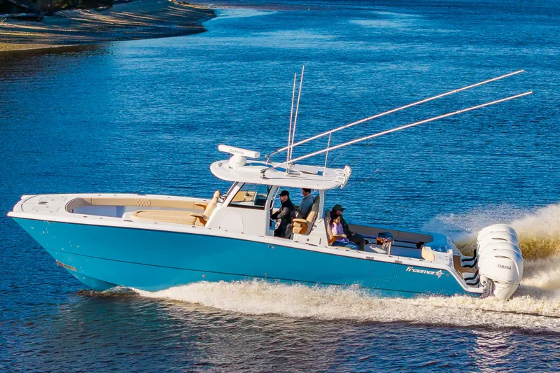 Krusty Krab II Yacht Photos Pics Freeman 38 boat 2025 cruising on calm waters.