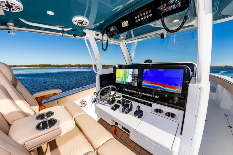 Krusty Krab II Yacht Photos Pics Interior of 2025 Freeman 38 boat with modern helm console.