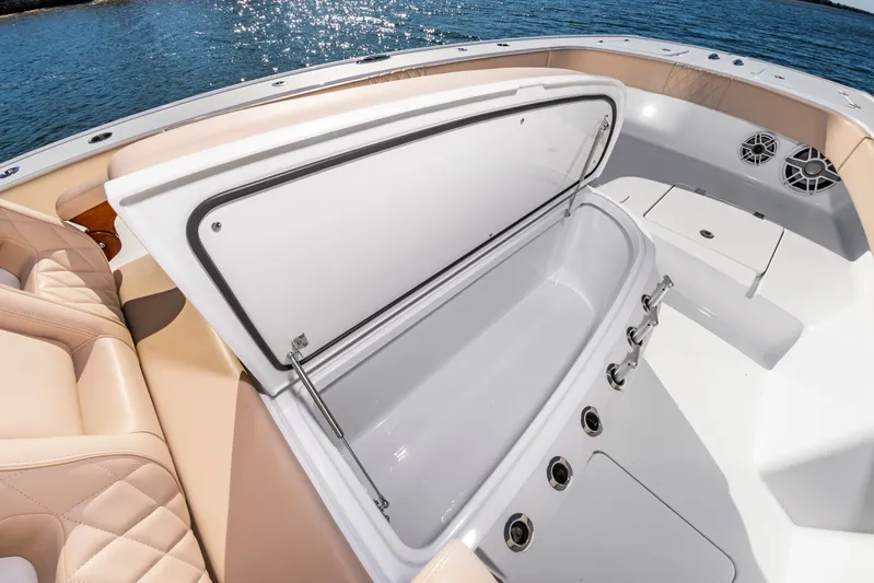 Krusty Krab II Yacht Photos Pics Freeman 38 boat 2025 with open storage compartment on deck.