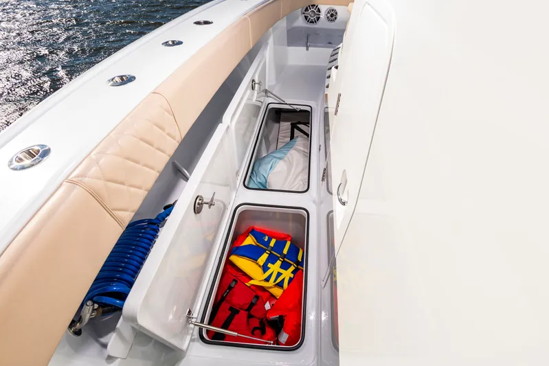 Krusty Krab II Yacht Photos Pics Freeman 38 boat 2025 with storage compartments and safety gear.