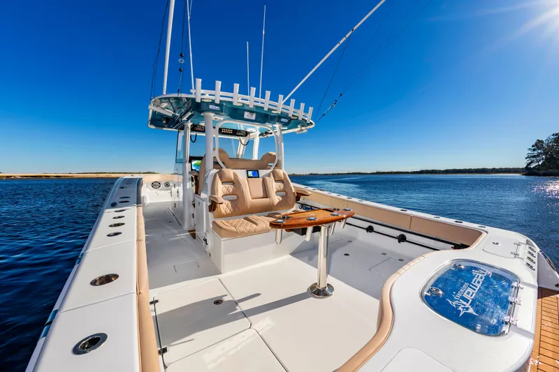 Krusty Krab II Yacht Photos Pics Freeman 38 boat 2025 on calm water under clear sky.