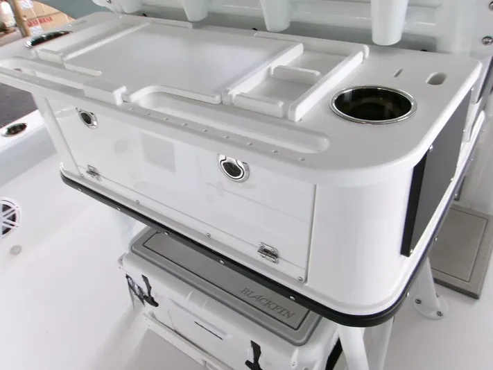  Yacht Photos Pics 2026 Blackfin 242 HB boat interior with storage compartments and cup holder.