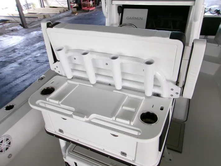  Yacht Photos Pics 2026 Blackfin 242 HB boat with rod holders and storage compartments.