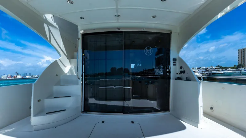 Next To Sell Yacht Photos Pics Luxury Marquis 59 yacht deck with glass doors, 2005 model, ocean view.