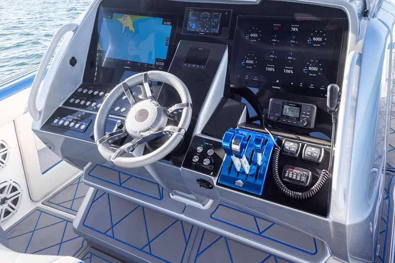 Loan Shark II Yacht Photos Pics Control panel of 2019 Deep Impact 399 Sport boat with advanced navigation and communication systems.