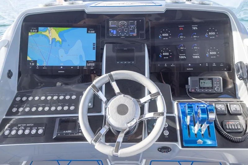 Loan Shark II Yacht Photos Pics Cockpit of 2019 Deep Impact 399 Sport boat with advanced navigation and control systems.