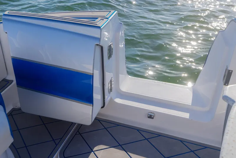 Loan Shark II Yacht Photos Pics 2019 Deep Impact 399 Sport boat with open side door, ocean view.