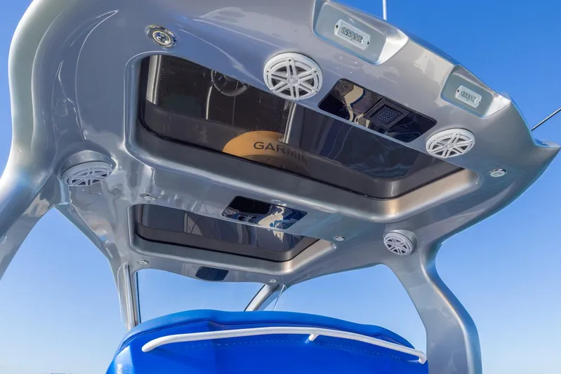 Loan Shark II Yacht Photos Pics 2019 Deep Impact 399 Sport boat roof with speakers and Garmin equipment.