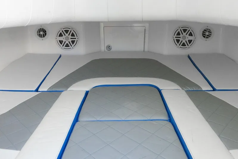 Loan Shark II Yacht Photos Pics Interior cabin of 2019 Deep Impact 399 Sport boat with cushioned seating.