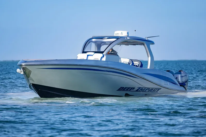 Loan Shark II Yacht Photos Pics 2019 Deep Impact 399 Sport boat cruising on open water.