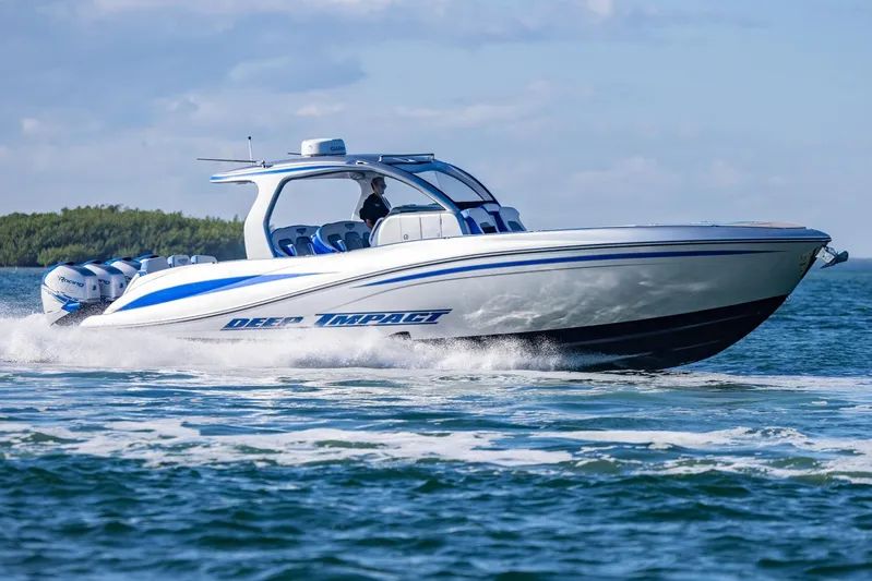 Loan Shark II Yacht Photos Pics 2019 Deep Impact 399 Sport boat cruising on open water.