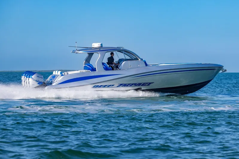 Loan Shark II Yacht Photos Pics 2019 Deep Impact 399 Sport boat cruising on open water.