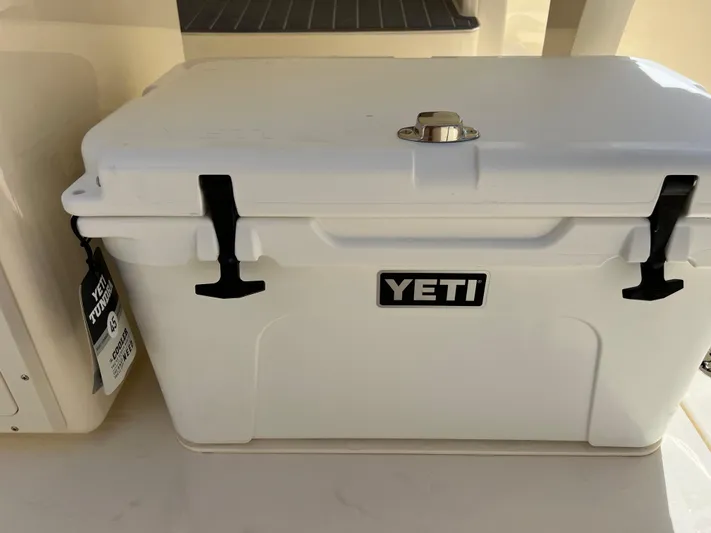  Yacht Photos Pics White YETI cooler on 2026 Scout 260 LXF boat deck.
