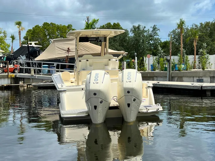  Yacht Photos Pics 2026 Scout 260 LXF boat docked with twin 200 V6 engines.