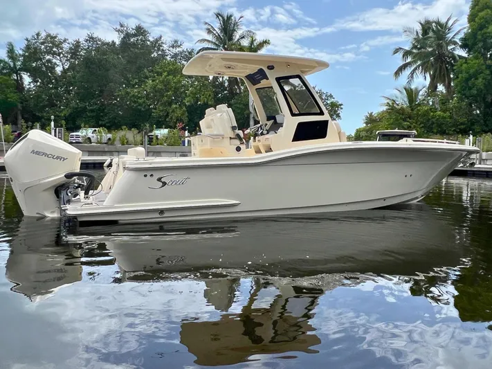 Yacht Photos Pics 2026 Scout 260 LXF boat on water, featuring sleek design and Mercury engine.