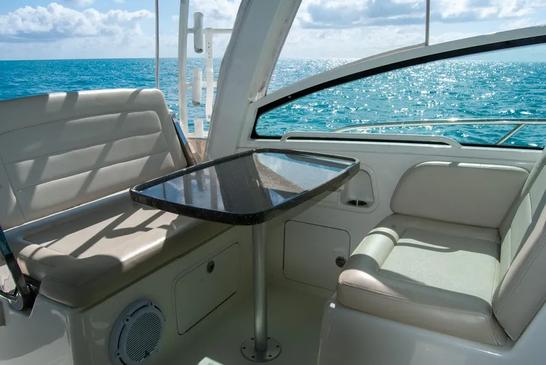 Yacht Photos Pics Interior of 2021 Boston Whaler 345 Conquest with ocean view and seating area.