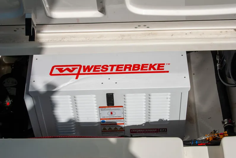  Yacht Photos Pics Westerbeke generator in a 2021 Boston Whaler 345 Conquest boat engine compartment.