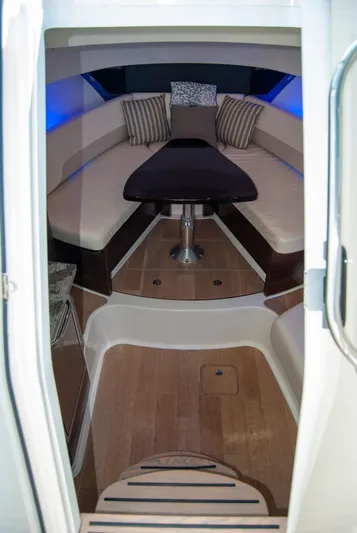  Yacht Photos Pics Interior of 2021 Boston Whaler 345 Conquest, featuring elegant seating and ambient lighting.