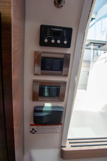  Yacht Photos Pics Control panel on a 2021 Boston Whaler 345 Conquest boat interior.