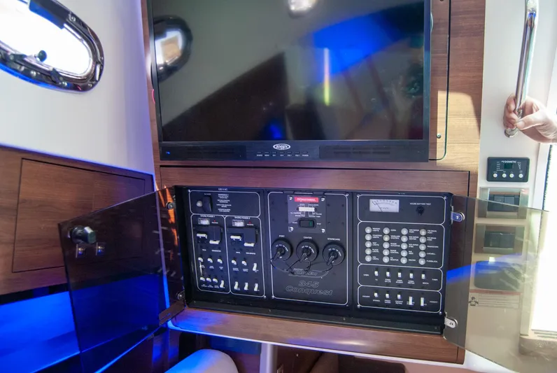  Yacht Photos Pics Control panel inside 2021 Boston Whaler 345 Conquest boat, featuring modern navigation and electronic systems.