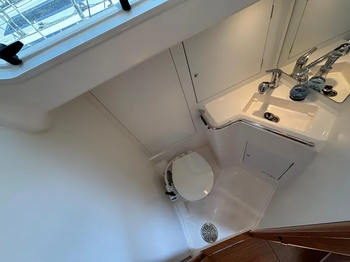 Rambunxious Yacht Photos Pics 2014 X-Yachts Xp 38 yacht bathroom with modern sink and toilet.