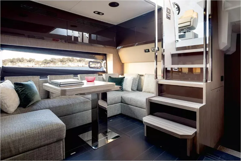  Yacht Photos Pics Luxurious interior of 2018 Azimut Atlantis 51 yacht with modern seating and elegant decor.