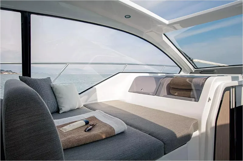  Yacht Photos Pics Luxurious interior of 2018 Azimut Atlantis 51 yacht with comfortable seating and ocean view.