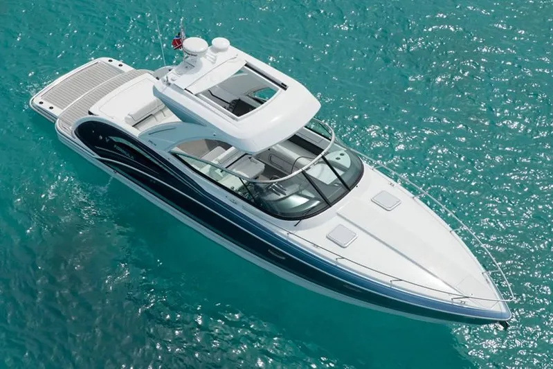  Yacht Photos Pics Manufacturer Provided Image: 2020 Formula 350 Sun Sport boat cruising on clear blue water.