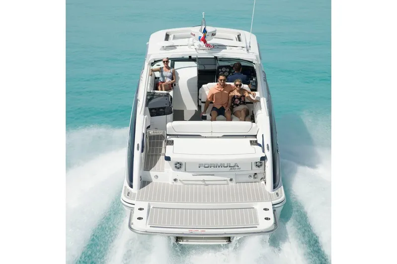  Yacht Photos Pics Manufacturer Provided Image: 2020 Formula 350 Sun Sport boat cruising on clear blue water.