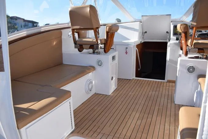 Cazadora Yacht Photos Pics Bench seats with storage below on bridge deck