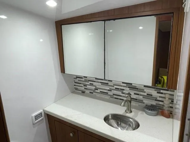 Cazadora Yacht Photos Pics Mirrored cabinets above sink vanity