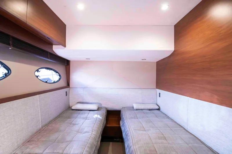  Yacht Photos Pics Luxurious twin cabin interior of 2017 Princess 52 yacht with modern design.