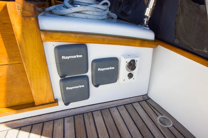 Sea G Yacht Photos Pics 1983 Cape George Cutter boat deck with Raymarine equipment and wooden accents.