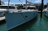 Sailboat Moody DS 45, 2011 model, docked in marina under clear sky.