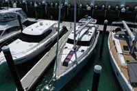 Moody DS 45 yacht docked at marina, 2011 model, surrounded by other boats.
