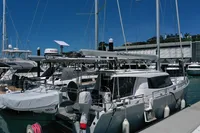 Sailboat Moody DS 45, 2011 model, docked in a marina under clear blue skies.