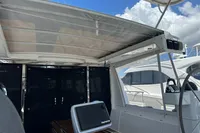 Cockpit of 2011 Moody DS 45 yacht with navigation equipment and canopy.
