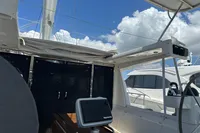 Cockpit view of 2011 Moody DS 45 sailboat with navigation equipment under a blue sky.