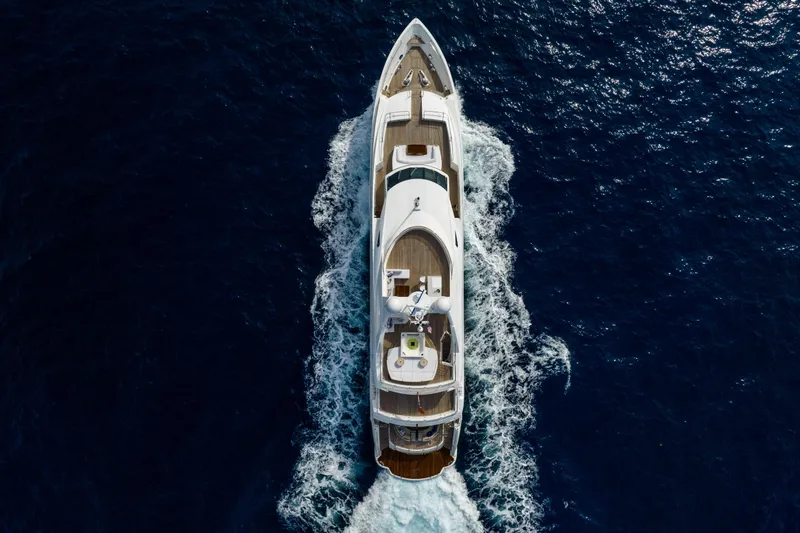 About Time Yacht Photos Pics Aerial view of 2010 Sunseeker 40 Metre Yacht cruising on open sea.