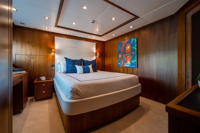 About Time Yacht Photos Pics Luxurious bedroom interior on 2010 Sunseeker 40 Metre Yacht with modern decor and artwork.