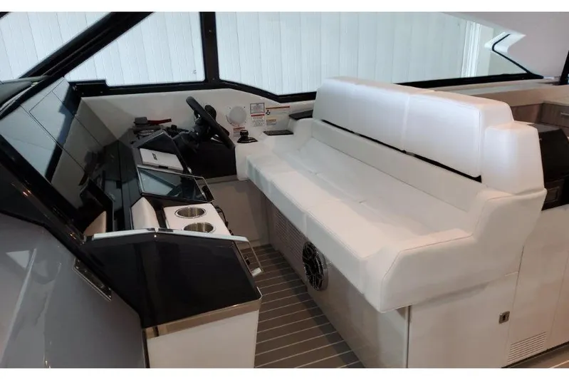  Yacht Photos Pics 2023 Formula 500 Super Sport Crossover interior with sleek white seating and modern dashboard.