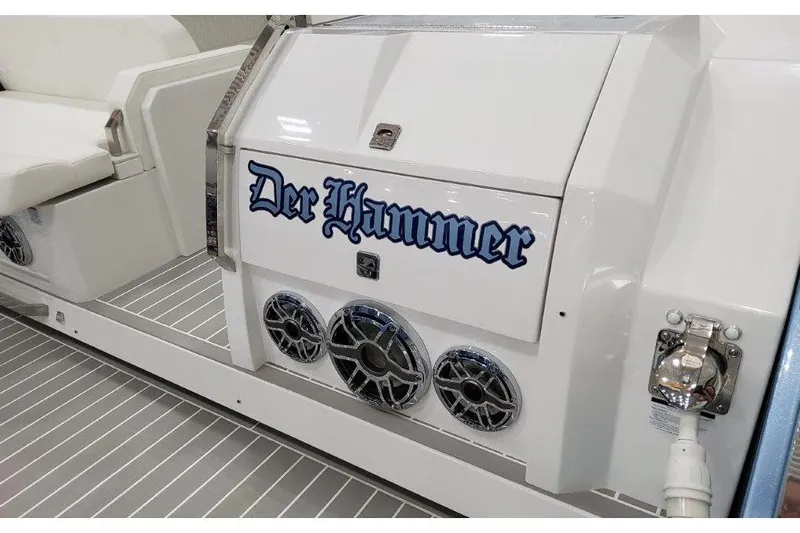  Yacht Photos Pics 2023 Formula 500 Super Sport Crossover boat with "Der Hammer" text and speakers.