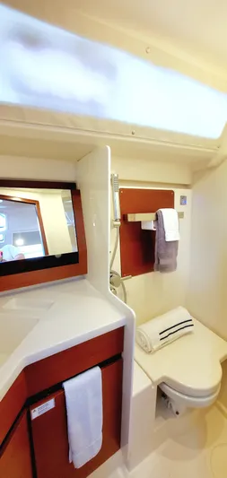 Hanse 388 #396 Yacht Photos Pics 2024 Hanse 388 yacht bathroom with modern fixtures and elegant design.