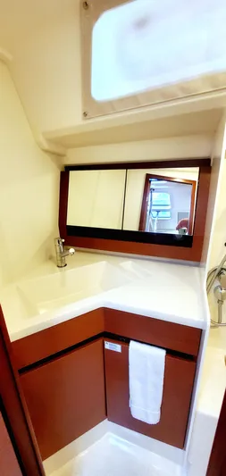 Hanse 388 #396 Yacht Photos Pics 2024 Hanse 388 yacht bathroom with modern sink and mirror.