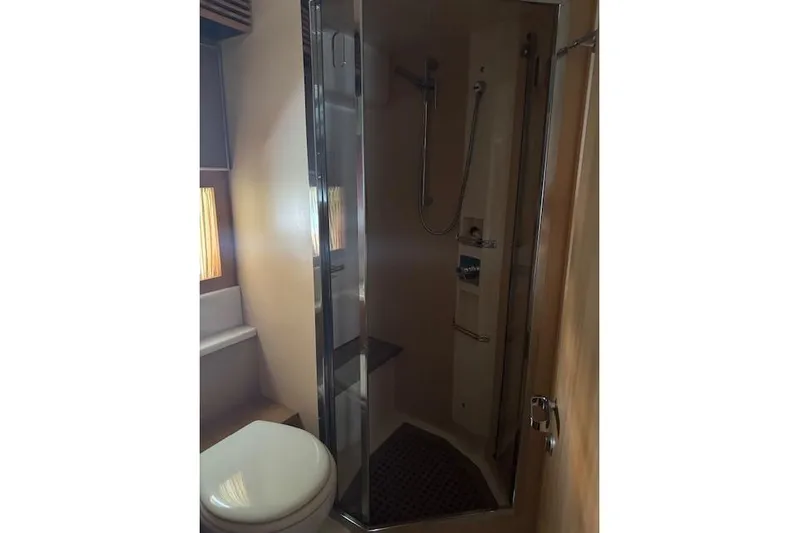  Yacht Photos Pics Bathroom interior of 2002 Riva 59 Mercurius yacht with shower and toilet.