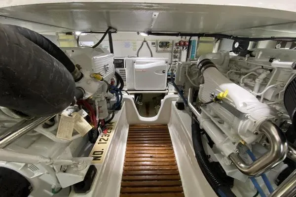 Whole Life Yacht Photos Pics Engine room of 2011 Grand Banks 46 Eastbay SX with dual engines and equipment.
